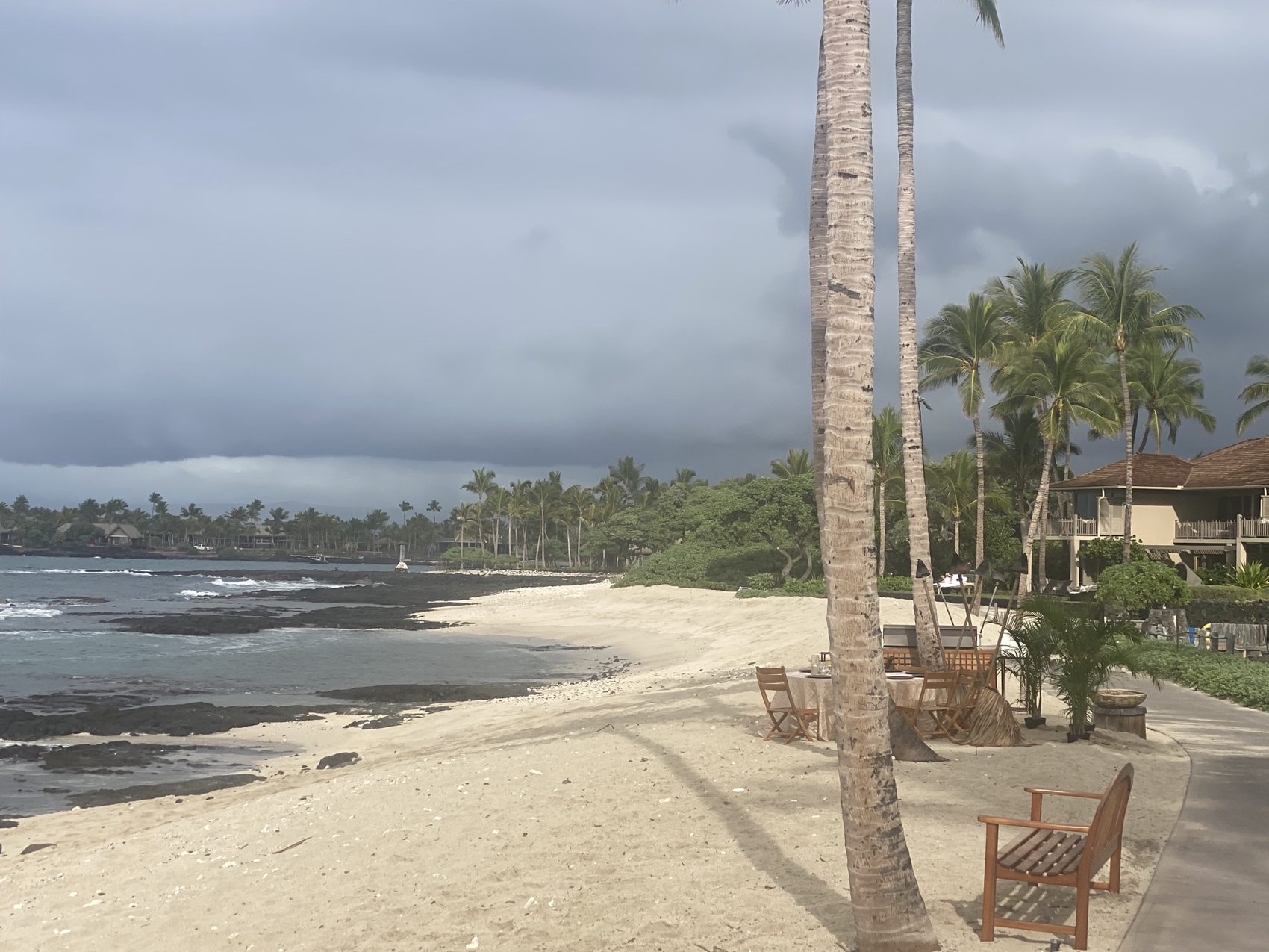 Lava shelf running into the water at the edge of the resort.